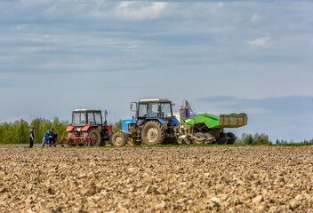 Agricultural work in the field in spring.