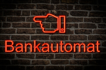 Leuchtreklame Bankautomat