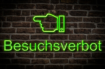 Fototapeta premium Leuchtreklame Besuchsverbot