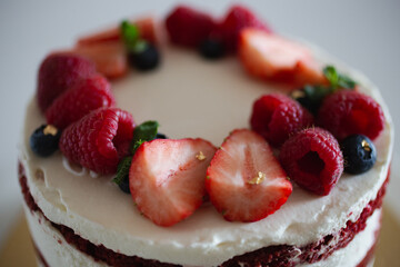 Bright and delicate sweet delicious cake with berries