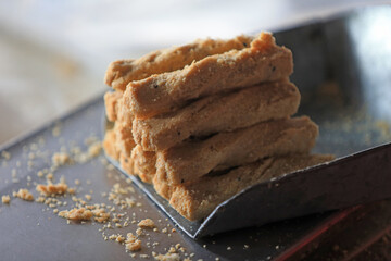 peanut crunchy candy in an iron container