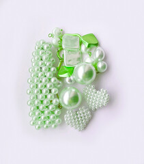 Modern accessories. Set of beautiful precious jewelry made of color gold, silver, and pearls. Fashion photos