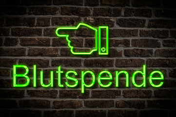 Fototapeta premium Leuchtreklame Blutspende