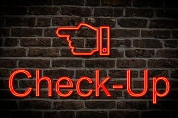 Fototapeta premium Leuchtreklame Check-up