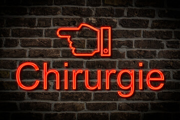 Fototapeta premium Leuchtreklame Chirurgie