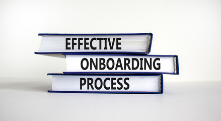 Effective onboarding process symbol. Books with words 'effective onboarding process' on beautiful white background. Business and effective onboarding process concept. Copy space.