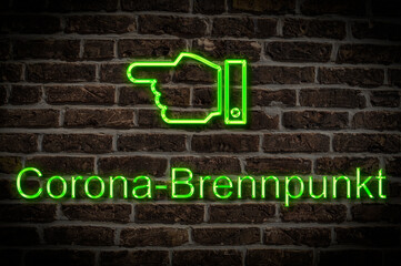 Fototapeta premium Leuchtreklame Corona-Brennpunkt