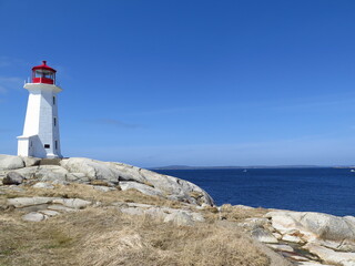 Fototapeta na wymiar the lighthouse at Peggys Cove in Halifax, Nova Scotia, Canada, April