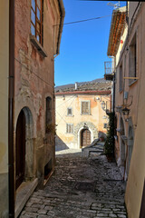 An alley between the old stone houses of Sassinoro, a medieval village in the province of Benevento.