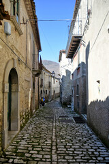 An alley between the old stone houses of Sassinoro, a medieval village in the province of Benevento.