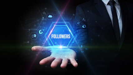 Man hand holding FOLLOWERS inscription, social media concept