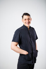 Fototapeta premium Close-up portrait of a young male doctor in medical clothes.