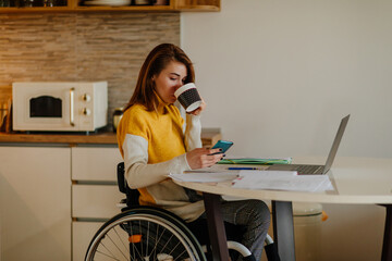 Woman in wheelchair drinking coffee