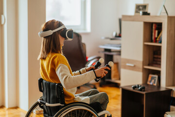Disabled woman having fun with VR technology