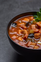 Soup with tomato, lemon and meatcloseup