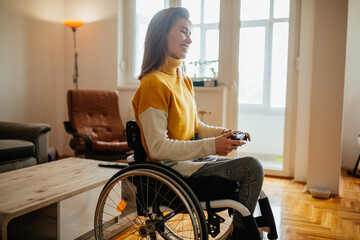 Woman with disabilities playing video games