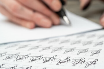 Closeup shot of the calligraphy training
