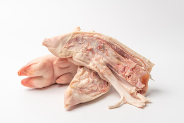 Fresh pig trotters on pure white background
