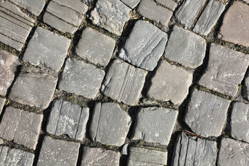 Weathered wall from wild stones, retro surface