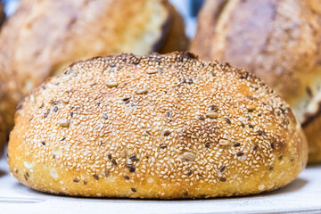 Craft bread on the table at the bakery. The concept of small industries and healthy food