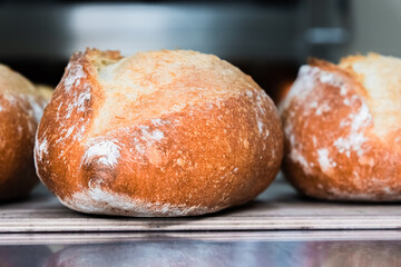 Craft bread on the table at the bakery. The concept of small industries and healthy food