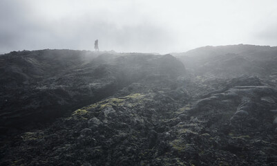 Steam clouds in lava field. Volcanic rocks