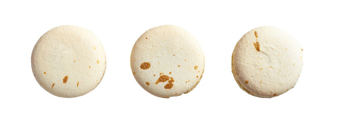 Traditional french macaron beige with taste vanilla caramel and chocolate chip isolated on white background. Sweet cookies macaron in different camera angles.