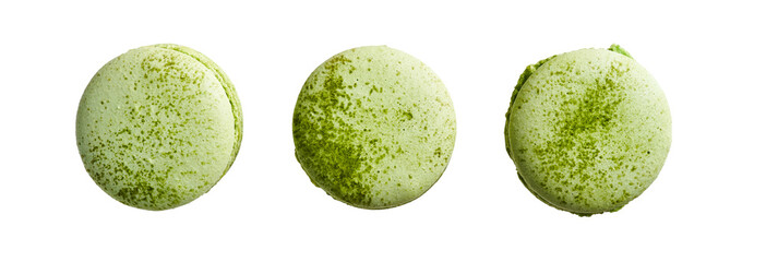 Traditional french cookie macaron green light with flavor lemongrass and matcha isolated on white background. Sweet cookies macaron in different camera angles.