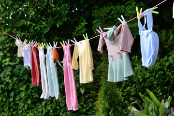 On Clothesline Hanging Baby Clothes - Old Custom