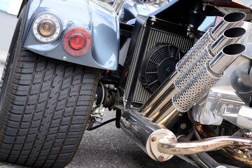 Exhaust And Tires Of A Trike