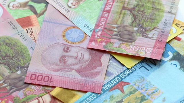 Costa Rica money. All kinds revolving around. Falling banknotes. Economic and business concept. Lottery, success