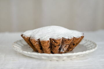 Homemade vanilla cake with raisins. Selective focus. Copy space for your text.
