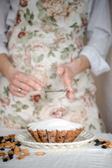Obraz na płótnie Canvas Homemade vanilla cake with raisins. Selective focus. Copy space for your text.