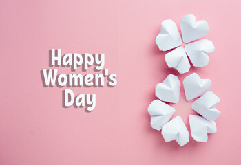 Happy Internationa Women's Day greeting card, March 8 or birthday Number eight 8 from paper hearts and flowers on pink