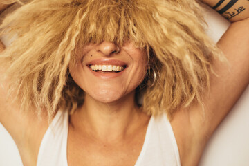 Woman laughing out loud at good jokes