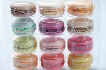 tasty macaroons on the white background