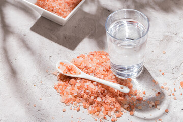 pink himalayan salt, in bowl on white background