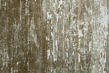 old gray wall with white vertical stripes. rough surface texture