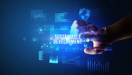 Hand touching SUSTAINABLE DEVELOPMENT inscription, new business technology concept