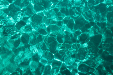 Ocean water background with shiny turquoise water.