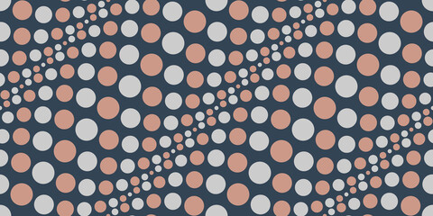 Seamless pattern. Pale orange and light gray circles. Dark blue background. Dotted textures, motives. For textile and decoration. Repeat graphic design. Geometric colorful images.