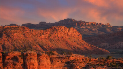 Scenic landscape of rock formations in Utah under evening sky