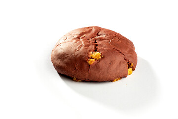 a piece of Red velvet crinkle cookies  stuffed pink cream,  holiday baking
side view