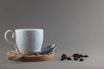 Cup of coffee on a gray background