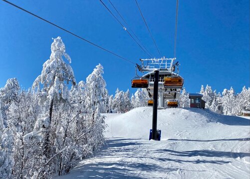 Ski Chair Lifts At Okemo Mountain Ski Resort At Sunny Winter Day In Vermont USA