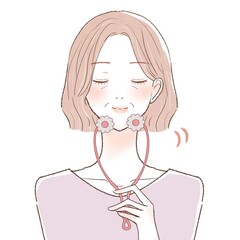 女性　中年　美顔ローラー　コロコロ