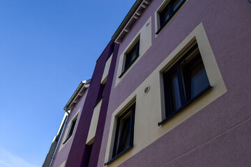 Fototapeta na wymiar facade of a lilac purple coloured building