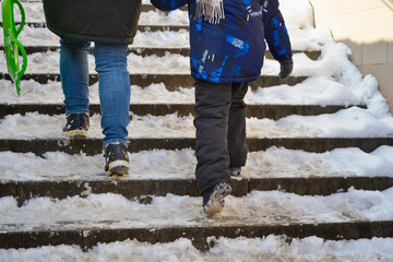 Kyiv. Ukraine. Winter in the city. Uncleared steps of an underground crossing after snowfall. 