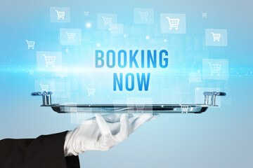 Waiter serving BOOKING NOW inscription, online shopping concept