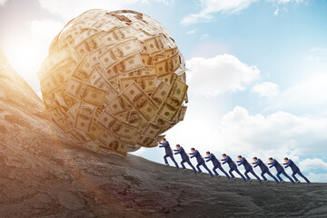 Businessman pushing away the dollar ball